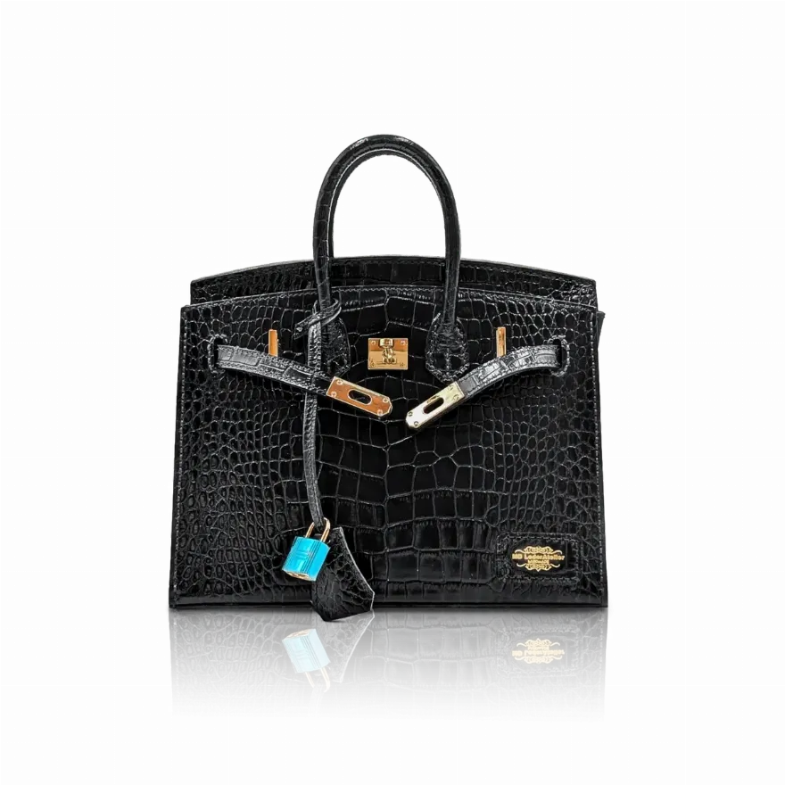 Designer-Tasche in Kroko-Optik, restauriert im Atelier