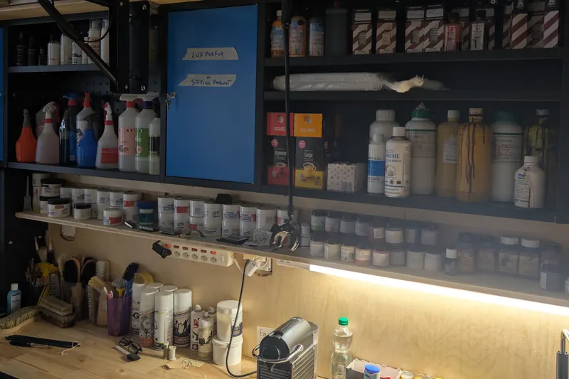 Shelves with the workshop's products