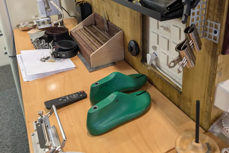 Shoe lasts and tools on the bench